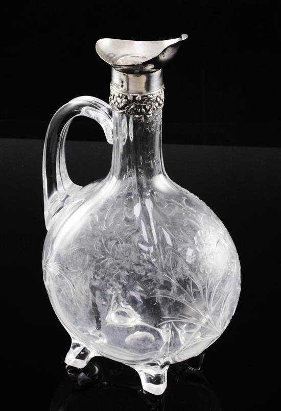 An Edwardian silver mounted rock crystal glass claret jug, c.1904, 24.5cm, crizzling